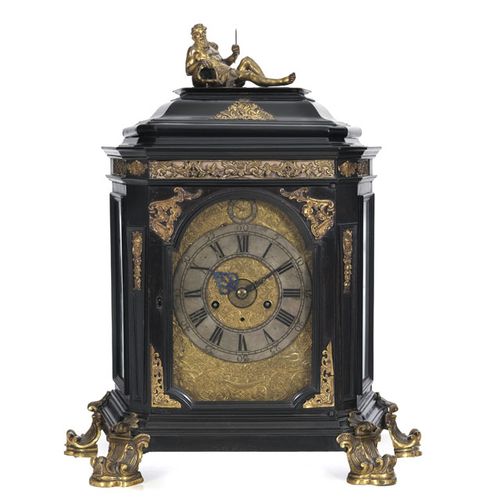 Null Table clock, early 18th c., in blackened wood and gilt bronze ornamentation&hellip;