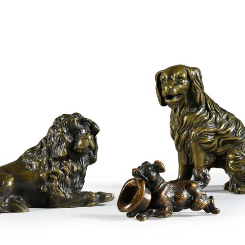 Lot of three dog figures in bronze: A spaniel forming a card holder, a small dog&hellip;