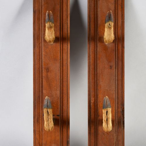 2 gun holders with deer feet, a deer shed is attached.