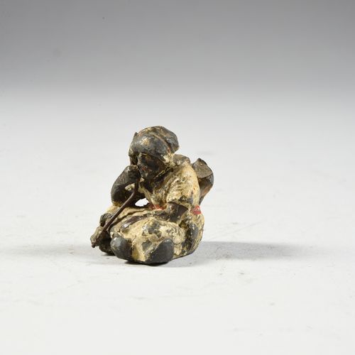 Lead from Nuremberg Seated native. Polychromed, paint missing. H. : 3,5 cm