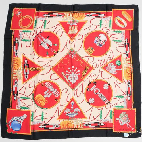 Cartier, Foulard "Must De Cartier" Soie en beige et rouge. Bordure en noir. 88x8&hellip;