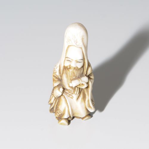 NETSUKE Japan, 19th/20th c. Ivory. Signed, illegible. Fukurokuju. H 5 cm.