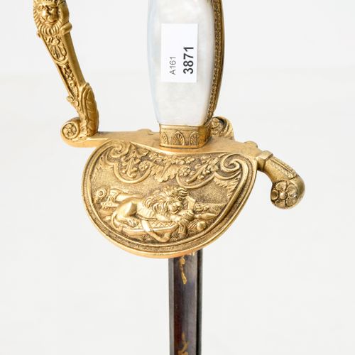 Galadegen Bavaria, circa 1830. Brass hilt gilt, pommel cap. Grip guard with lion&hellip;
