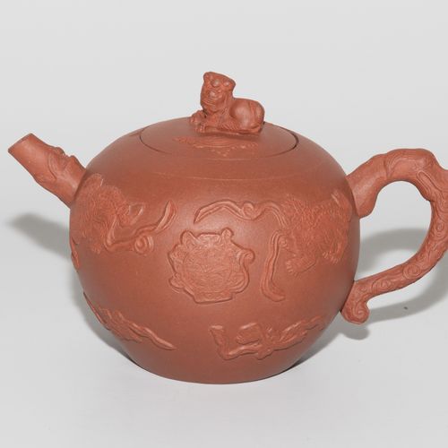 Teekanne Teapot

China. Yixing pottery. Brown-red body with relief guard lions p&hellip;