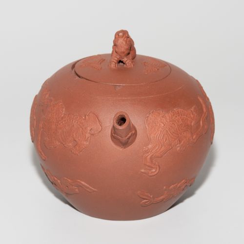 Teekanne Teapot

China. Yixing pottery. Brown-red body with relief guard lions p&hellip;