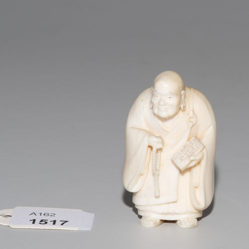 NETSUKE Netsuke

Japan, 20th c. Ivory. Signed. Buddhist abbot with prayer chain &hellip;