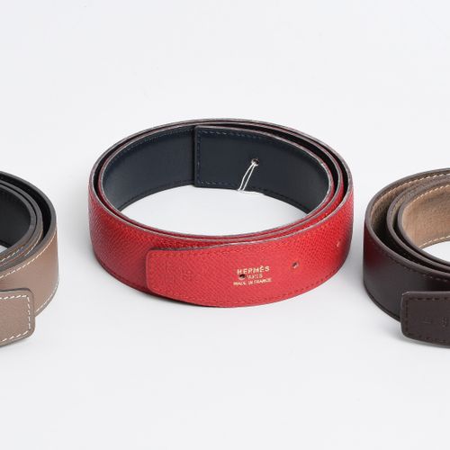 Hermès, 3 Gürtelriemen Hermès, 3 belt straps
Reversible straps in red-black, bro&hellip;