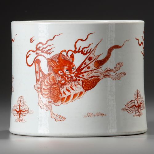 A CHINESE IRON-RED 'MYTHICAL BEAST' BRUSH POT, BITONG, QING DYNASTY The gently w&hellip;
