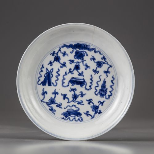 A CHINESE BLUE AND WHITE 'HUNDRED' TREASURES DISH, KANGXI (1662-1722) The dish i&hellip;