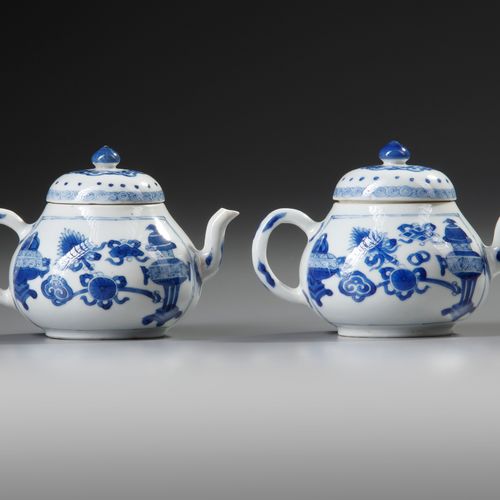 A PAIR OF SMALL CHINESE BLUE AND WHITE TEAPOTS AND COVERS, KANGXI PERIOD (1662-1&hellip;