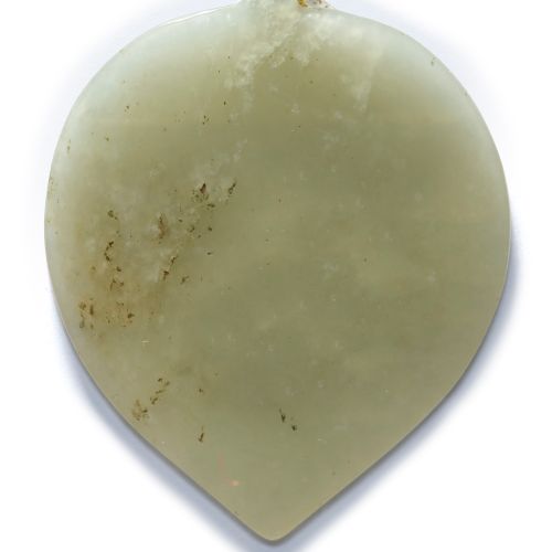 A FINE CARVED JADE PENDANT A jade pear-shaped pendant , engraved with the text "&hellip;
