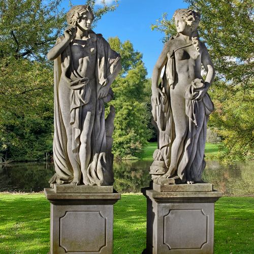 A PAIR OF SCULPTED LIMESTONE LIFESIZE FIGURES OF MINERVA AND JUNO, LATE 20TH CEN&hellip;