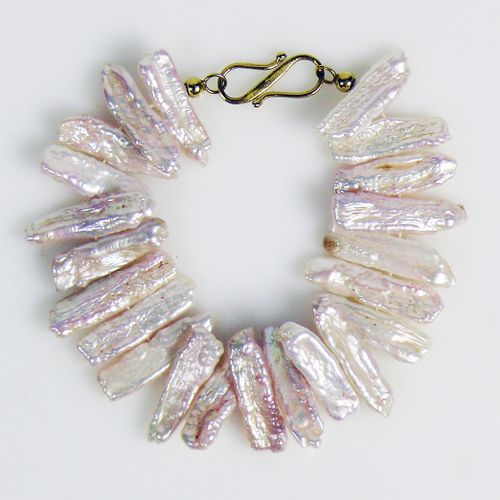 Null mother-of-pearl bracelet bar decor; clasp in 18ct GG; L: 19,5 cm