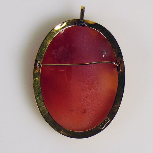 Null Cameo pendant/brooch high oval; in 14ct GG setting; woman's head in relief;&hellip;
