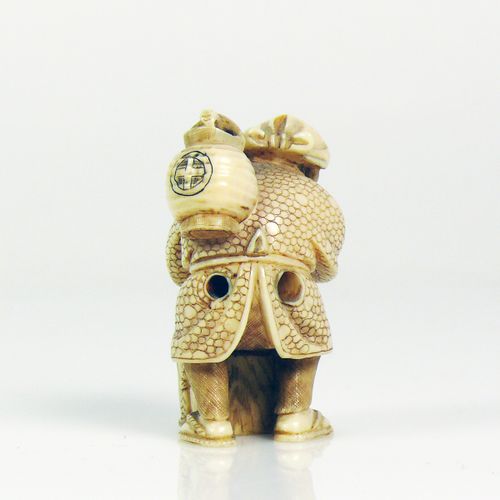 Null Netsuke (Japan, c. 1900) standing man with water vessel on his back; ivory;&hellip;