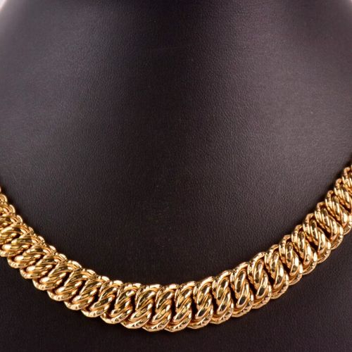 Null * Collier souple en or jaune750/1000 à maille américaine.

Poinçon tête d'a&hellip;