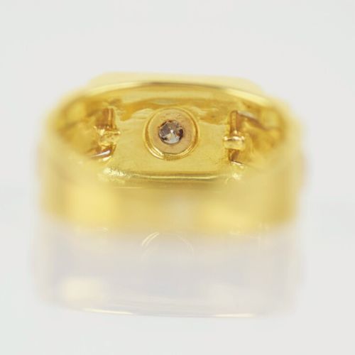 Null Bague en or jaune et gris 750/1000 serti sur un chaton carré d'un diamant t&hellip;