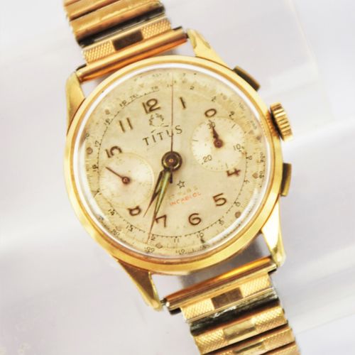 Null TITUS, modèle 5319

Bracelet montre chronographe d'homme en plaqué or à chi&hellip;