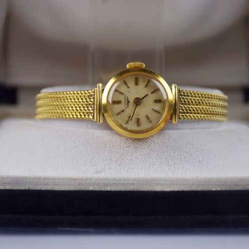 Null 
LONGINES




Bracelet montre de dame en or jaune 750/1000 à lunette ronde,&hellip;