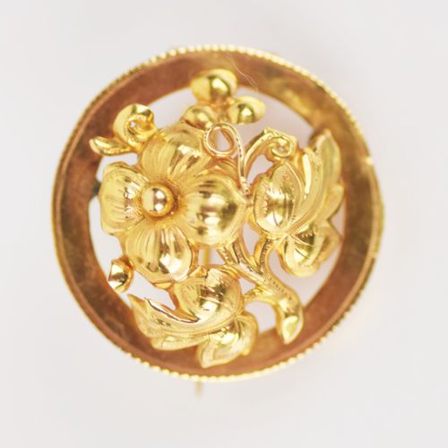 Null Broche ronde en or jaune 750/1000 de forme ronde à décor ajouré et bombé d'&hellip;