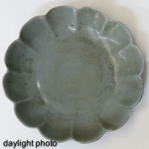 A Celadon Scalloped Dish 17 cm. In diameter.