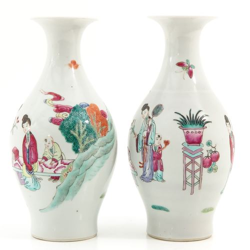 A pair of famille rose vases Depicting gathering of Chinese figures in garden, 2&hellip;