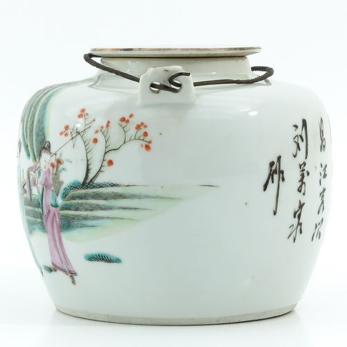 A famille rose teapot Depicting Chinese figures in garden, 12 cm. Tall.