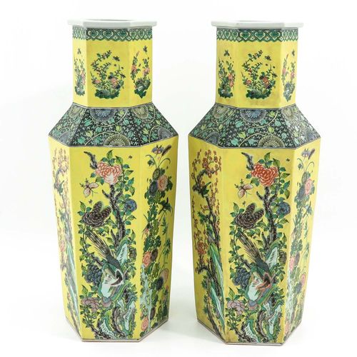A Pair of Floral Decor Vases Yellow ground with floral decor on 6 sides, 63 cm. &hellip;