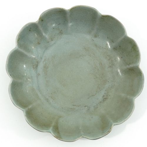 A Celadon Scalloped Dish 17 cm. In diameter.