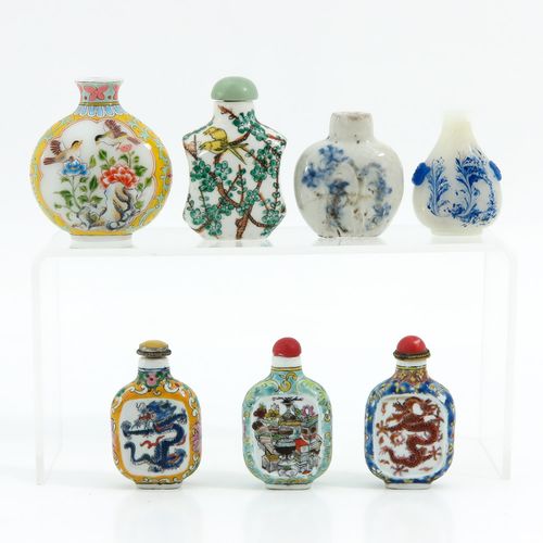 A Collection of 7 Snuff Bottles In diverse sizes and decors, largest snuff bottl&hellip;