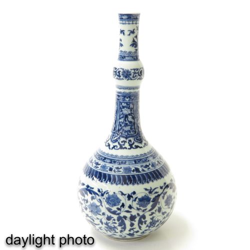 A Blue and White Gourd Vase Floral decor, Kangxi Period, 42 cm. Tall, crackle in&hellip;