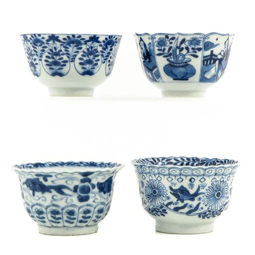 Null 杯子和茶杯系列
包括4个杯子和4个碟子，蓝色和白色的装饰，包括康熙标记和18世纪，最大的碟子直径为15厘米，有缺口和毛边。