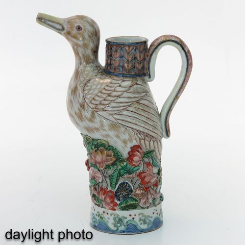 Null A Figural Imari Pitcher
Depicting bird with flowers, 22 cm. Tall, handle is&hellip;