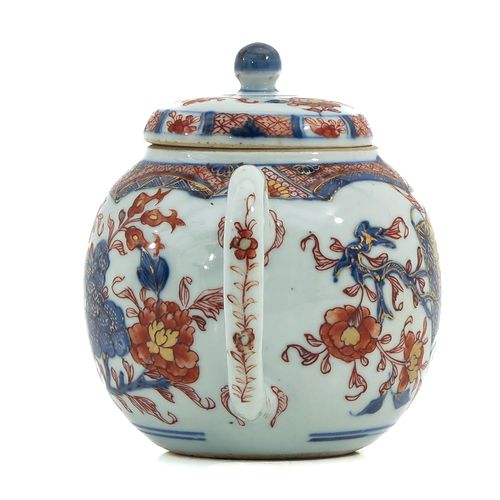 Null An Imari Teapot
Scroll and floral decor, 18th Century, 12 cm. Tall, chip.