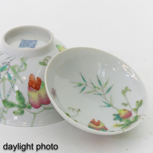 Null A Pair of Famille Rose Cups and Covers
Decorated with fruit and butterflies&hellip;