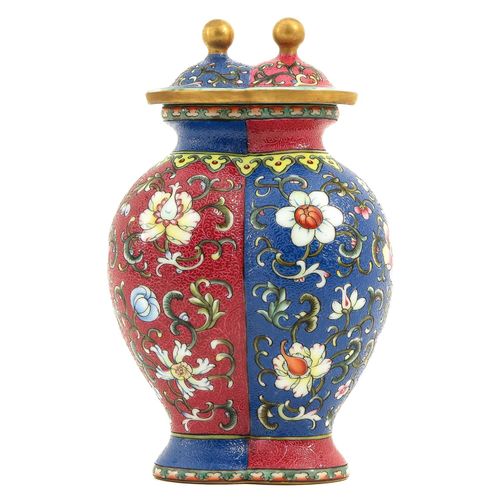 Null A Famille Rose Vase with Cover
Blue and ruby ground decorated with flowers,&hellip;