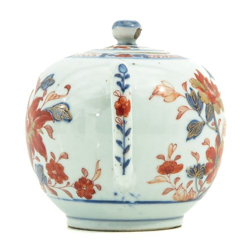 Null 伊万里茶壶
花卉装饰，18世纪，12厘米高，芯片。