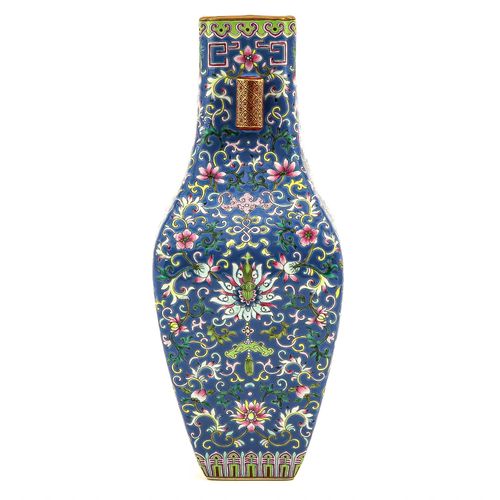 Null A Famille Rose Vase
Blue ground floral decor, front and back of vase depict&hellip;