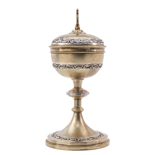 Null A Gilded Silver Ciborium
23 cm. Tall.