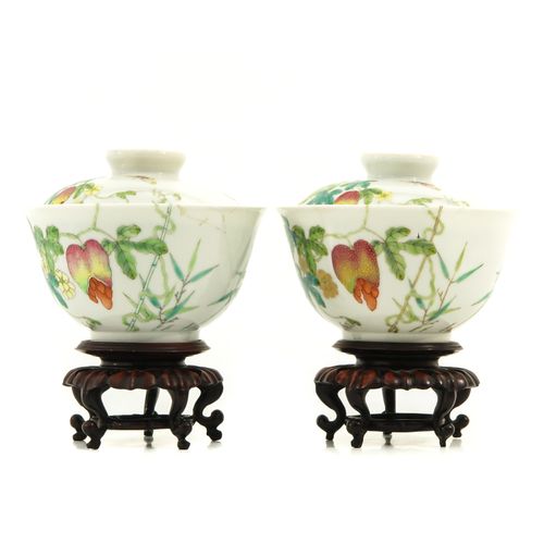 Null A Pair of Famille Rose Cups and Covers
Decorated with fruit and butterflies&hellip;