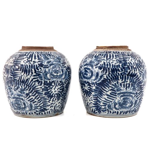 Null A Pair of Ginger Jars
Blue and White floral decor, 23 cm. Tall.