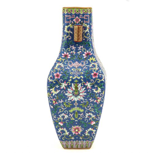 Null A Famille Rose Vase
Blue ground floral decor, front and back of vase depict&hellip;