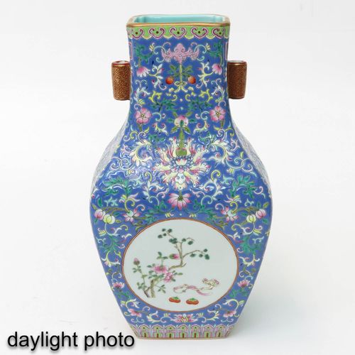 Null A Famille Rose Vase
Blue ground floral decor, front and back of vase depict&hellip;
