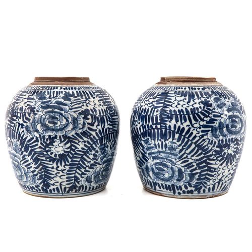 Null A Pair of Ginger Jars
Blue and White floral decor, 23 cm. Tall.