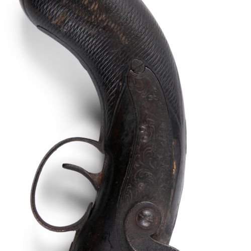 Null 一把19世纪的大衣枪，八角形枪管的棋盘式握把。长36厘米