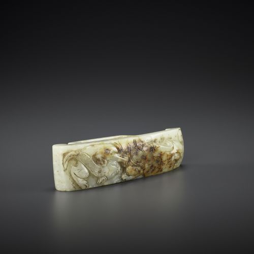 AN ARCHASITIC JADE SCABBARD SLIDE WITH DRAGON AMID CLOUDS, EARLY MING SCABBARDIN&hellip;
