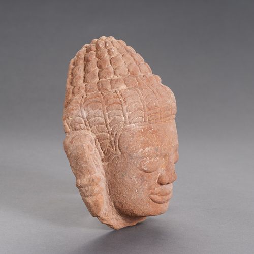 A KHMER SANDSTONE HEAD OF BUDDHA TÊTE DE BOUDDHA EN PIERRE DE SABLE KHMER
Empire&hellip;