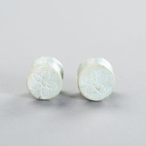 A PAIR OF STONE EARPLUGS A PAIR OF STONE EARPLUGS
Southeast Asia, early 20th cen&hellip;