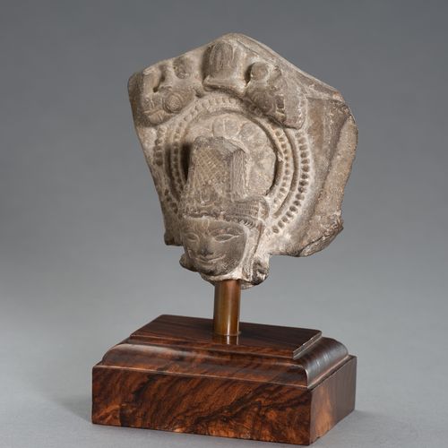 AN INDIAN STONE HEAD OF BUDDHA AN INDIAN STONE HEAD OF BUDDHA
Northern India, 15&hellip;