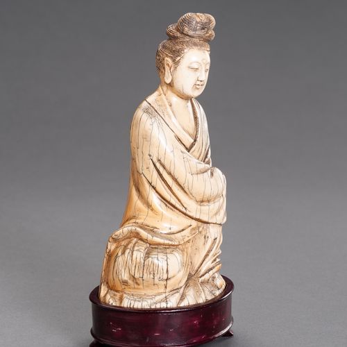 A MING-STYLE IVORY FIGURE OF GUANYIN, QING DYNASTY A MING-STYLE IVORY FIGURE OF &hellip;